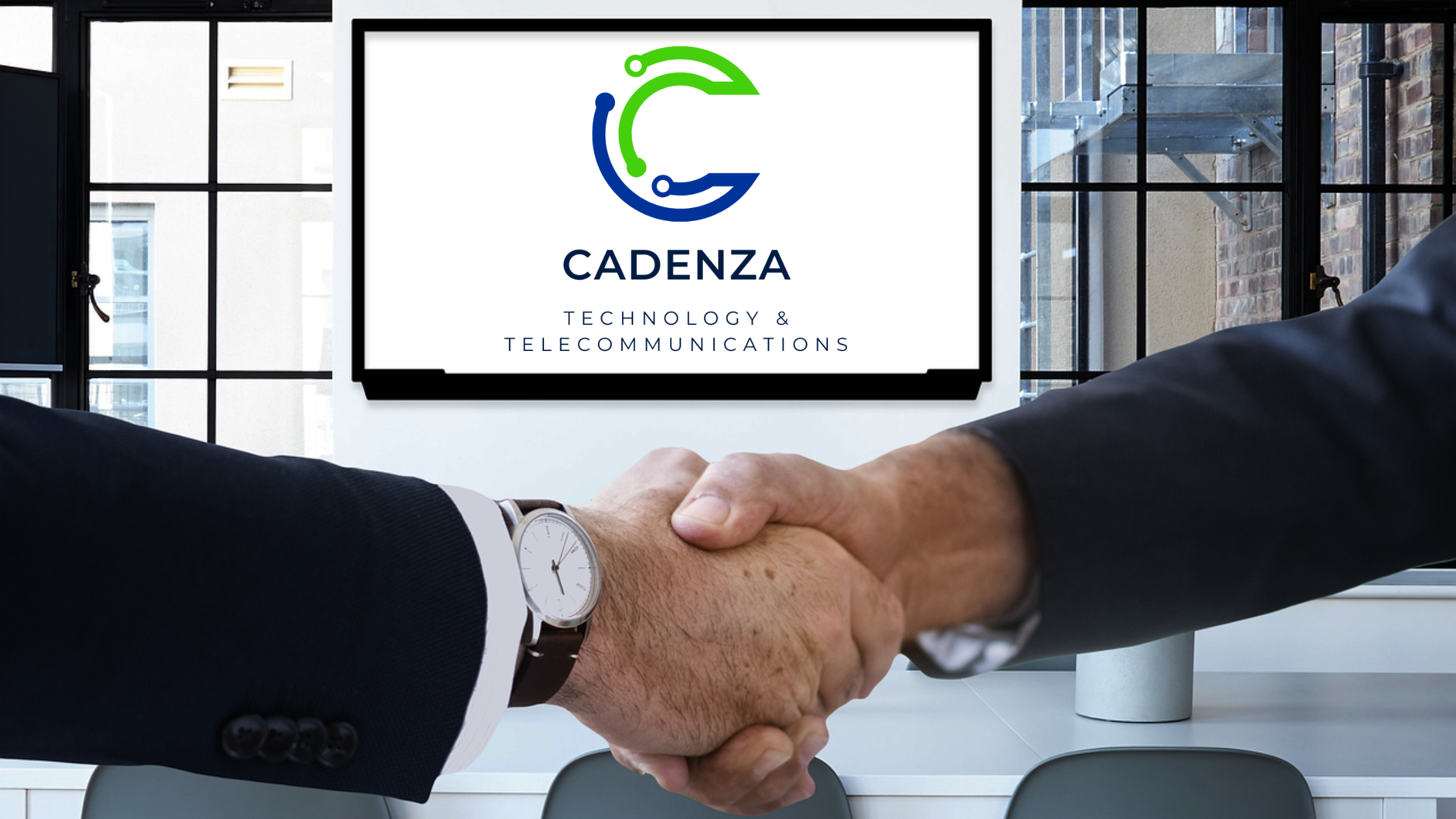 two men shaking hands. A TV in the background with the Cadenza logo